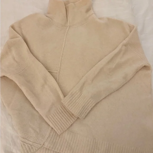 Cream Turtleneck Sweater with belled sleeves